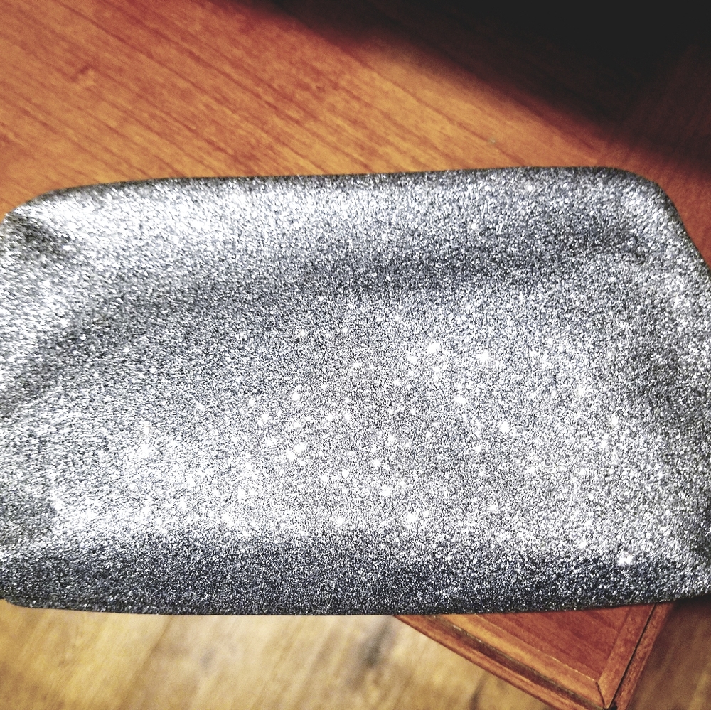 Silver clutch to make evening a little glam!